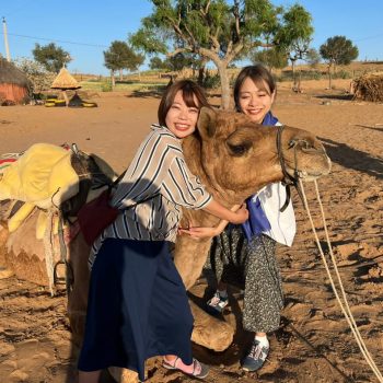Tourists enjoying Osian Desert Camel Safari near Jodhpur in the Thar Desert Rajasthan